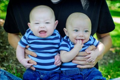 Twins, smiling, laughing