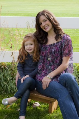 girl and mom, field, bench, smiling